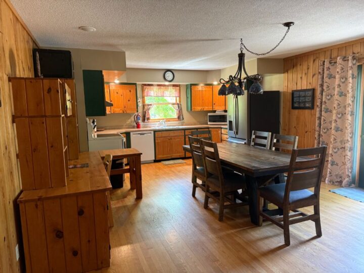 Rustic kitchen and dining area with wooden furniture